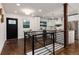 Modern kitchen features white cabinets, stainless steel appliances, and an island at 3360 Broadway St, Boulder, CO 80304