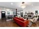 Bright living room with fireplace, hardwood floors, and stylish furnishings at 3360 Broadway St, Boulder, CO 80304
