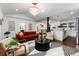 Spacious living room with hardwood floors and a view into the kitchen at 3360 Broadway St, Boulder, CO 80304