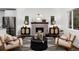 Living room with fireplace, hardwood floors, and stylish decor at 3360 Broadway St, Boulder, CO 80304