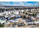 Aerial view of community clubhouse, tennis courts, and parking lot at 13739 E Marina Dr # B, Aurora, CO 80014