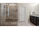 Bathroom with a walk-in shower and tiled walls at 4122 Spanish Oaks Trl, Castle Rock, CO 80108