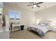 Spacious bedroom with a queen bed and plenty of natural light at 4122 Spanish Oaks Trl, Castle Rock, CO 80108