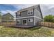 Well-maintained home exterior with patio and fully fenced yard at 1488 N Stratton Ave, Castle Rock, CO 80104