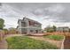 This backyard features an extended patio and a fenced perimeter at 1488 N Stratton Ave, Castle Rock, CO 80104