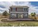 Beautiful backyard featuring a cozy patio and lush green lawn at 1488 N Stratton Ave, Castle Rock, CO 80104