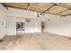 This garage has ample space with an opener, rack, and interior door at 1488 N Stratton Ave, Castle Rock, CO 80104