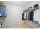 Spacious walk-in closet with shelving and hanging racks for optimal storage at 8274 S Jackson St, Centennial, CO 80122