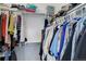 Walk-in closet offering ample storage with built-in shelving and organized clothing racks at 18027 Telford Ave, Parker, CO 80134