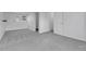 Basement with neutral carpet, and an open doorway to other rooms at 4580 W 109Th Ave, Westminster, CO 80031