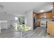 Open-concept kitchen flows into a dining area and features modern appliances and ample storage at 4580 W 109Th Ave, Westminster, CO 80031