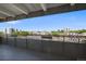 Wide balcony with a city view and wrought iron railings, perfect for outdoor relaxation at 1441 N Humboldt St # 504, Denver, CO 80218