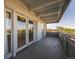 Balcony with city views and glass doors leading inside, blending indoor-outdoor living at 1441 N Humboldt St # 504, Denver, CO 80218