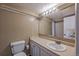 Well-lit bathroom with a vanity, sink, and a large mirror, providing a functional space at 1441 N Humboldt St # 504, Denver, CO 80218