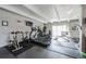 Community gym featuring cardio machines, weights, and natural light at 1441 N Humboldt St # 504, Denver, CO 80218
