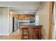 Well-equipped kitchen features a breakfast bar and modern appliances at 1441 N Humboldt St # 504, Denver, CO 80218