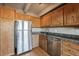 Updated kitchen with stainless steel appliances and wood cabinetry at 1441 N Humboldt St # 504, Denver, CO 80218