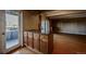 Bright living room with balcony access and adjacent kitchen at 1441 N Humboldt St # 504, Denver, CO 80218