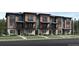 New townhouse row with modern architecture, landscaping and individual stoops at 2540 Josephine Way, Superior, CO 80027