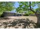 Spacious backyard with a patio area, perfect for outdoor entertaining and relaxation at 971 Ursula St, Aurora, CO 80011