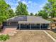 Inviting single-story home with modern solar panels and a welcoming front yard at 971 Ursula St, Aurora, CO 80011