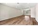 Spacious living room featuring hardwood floors, recessed lighting and a view to the front yard at 971 Ursula St, Aurora, CO 80011