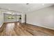 Open-concept living room featuring hardwood floors, recessed lighting and neutral paint at 971 Ursula St, Aurora, CO 80011