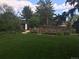 Large backyard with shed and raised garden beds at 5030 Aspen Dr, Littleton, CO 80123