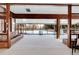 Sunroom with walls of windows and carpeted floor at 5030 Aspen Dr, Littleton, CO 80123