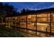 Sunroom at night with furniture and brick walls at 5030 Aspen Dr, Littleton, CO 80123