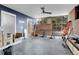 Workshop with concrete floor and ample natural light at 5030 Aspen Dr, Littleton, CO 80123