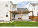 A backyard patio featuring a charming pergola perfect for outdoor relaxation and entertainment at 10106 E 59Th Pl, Denver, CO 80238