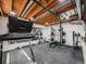 Basement gym with a treadmill and weight rack at 3100 Rockbridge Dr, Highlands Ranch, CO 80129