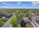 Scenic aerial perspective of a neighborhood with mountain views, showcasing the home's location at 1089 S Osceola St, Denver, CO 80219