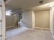 Finished basement with neutral carpet, recessed lighting, and easy access to the staircase at 3632 Leyden St, Denver, CO 80207