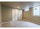 Finished basement includes carpet and a window as well as double door access to closet at 3632 Leyden St, Denver, CO 80207
