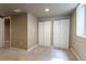 Finished basement area with wall-to-wall carpeting and closet space at 3632 Leyden St, Denver, CO 80207