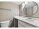 Bathroom with bright vanity and a large mirror at 447 S Memphis Way # 7, Aurora, CO 80017