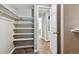 Walk-in closet offers adjustable shelving for customizable storage solutions at 447 S Memphis Way # 7, Aurora, CO 80017
