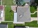 A bird's eye view of the property showcasing the lawn, roof and surrounding landscape at 2321 Lima St, Aurora, CO 80010