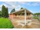 Backyard with a covered patio, perfect for outdoor entertaining and relaxation at 2321 Lima St, Aurora, CO 80010