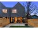 Exterior view of backyard featuring a patio area and a grass lawn at 2376 S Bannock St, Denver, CO 80223