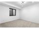 Finished basement rec room featuring a window well, carpeted floors, and recessed lighting at 2376 S Bannock St, Denver, CO 80223