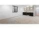Finished basement with wet bar, recessed lights, and tile accent wall for stylish entertaining at 2376 S Bannock St, Denver, CO 80223