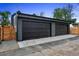 Two-car garage featuring an automatic door at 2376 S Bannock St, Denver, CO 80223