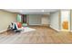 Finished basement featuring neutral walls, open living space, and a convenient walk-up access to the main levels at 5017 Bella Vista Dr, Longmont, CO 80503