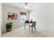 Bedroom featuring neutral carpet, a work desk and a large plant at 5017 Bella Vista Dr, Longmont, CO 80503