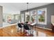 Bright breakfast nook with hardwood floors, views to the backyard and access to the living room at 5017 Bella Vista Dr, Longmont, CO 80503