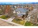 Stunning home with manicured lawn and view of the front exterior and neighboring homes at 5017 Bella Vista Dr, Longmont, CO 80503