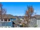 Neighborhood exterior views with mountain views in the distance on a sunny day at 5017 Bella Vista Dr, Longmont, CO 80503